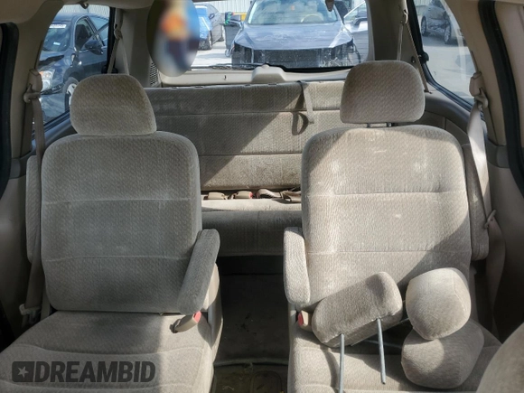 2000 Honda Odyssey LX z VIN 2HKRL1850YH575430, wystawiony jako Copart lot #53260255 z przebiegiem 188 847 mil mil oraz Szkoda całkowita • Salvage title. Historia ofert i sprzedaży dostępna na DreamBid. Obrazek 10.