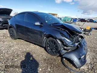 2024 Tesla Model Y Long Range z VIN 7SAYGDEEXRA222408, wystawiony jako Copart lot #49119125 z przebiegiem 20 773 mil mil oraz Szkoda całkowita • Salvage title. Historia ofert i sprzedaży dostępna na DreamBid. Obrazek 4.