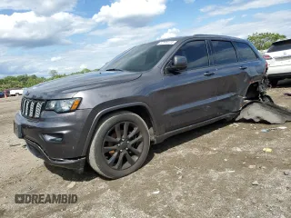 2018 Jeep Grand Cherokee Altitude with VIN 1C4RJFAG4JC207154, listed as a Copart auction lot 57599115 with 94,742 mi miles and Salvage title. Bid and sale history available at DreamBid. Image 1.