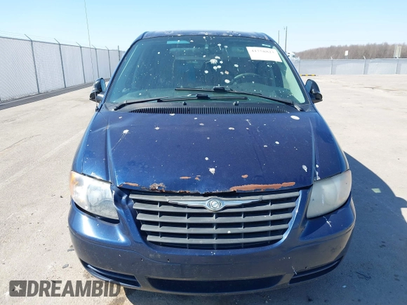 2006 Chrysler Town & Country with VIN 1A4GP45R36B533363, listed as a IAAI auction lot 41758823 with 265,663 mi miles and . Bid and sale history available at DreamBid. Image 6.