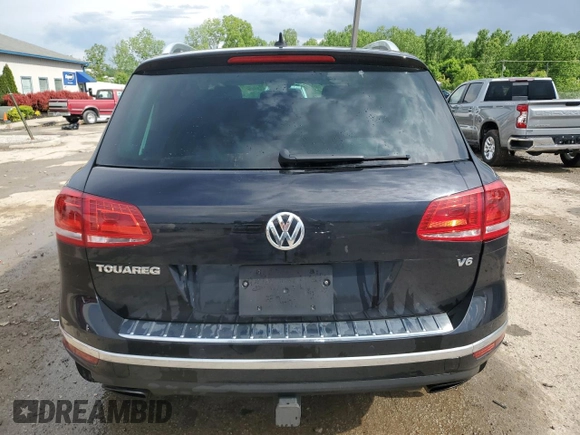 2016 Volkswagen Touareg Sport z VIN WVGEF9BP3GD008823, wystawiony jako Copart lot #56838985 z przebiegiem 49 612 mil mil oraz Nie do naprawy • Non repairable. Historia ofert i sprzedaży dostępna na DreamBid. Obrazek 6.