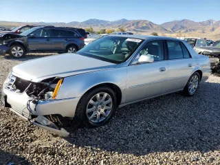 2009 Cadillac DTS 1SC z VIN 1G6KD57Y89U105190, wystawiony jako Copart lot #77560874 z przebiegiem 166 134 mil mil oraz Szkoda całkowita • Salvage title. Historia ofert i sprzedaży dostępna na DreamBid. Obrazek 1.