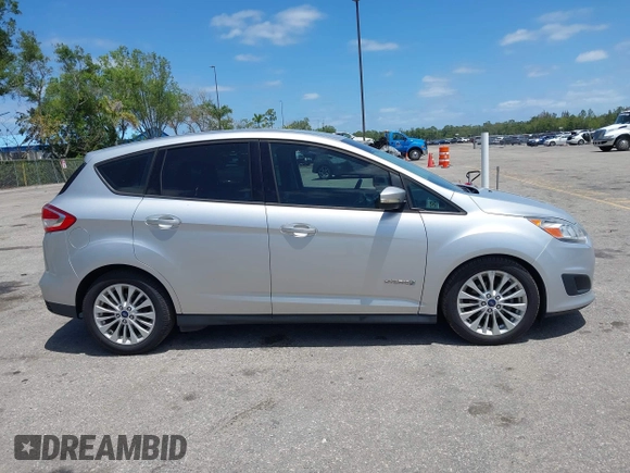 2018 Ford C-Max SE z VIN 1FADP5AU1JL104191, wystawiony jako IAAI lot #42153994 z przebiegiem 132 413 mil mil oraz . Historia ofert i sprzedaży dostępna na DreamBid. Obrazek 13.