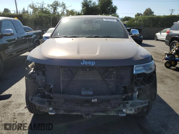 2019 Jeep Grand Cherokee Overland with VIN 1C4RJFCT7KC833390, listed as a Copart auction lot 74015774 with 64,598 mi miles and Salvage Title. Bid and sale history available at carsss.com. Image 5.