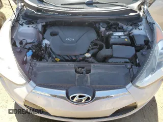 2013 Hyundai Veloster w/Gray Int z VIN KMHTC6AD9DU138719, wystawiony jako Copart lot #57494735 z przebiegiem 149 255 mil mil oraz Szkoda całkowita • Salvage title. Historia ofert i sprzedaży dostępna na DreamBid. Obrazek 11.