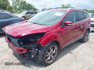 2013 Ford Escape Titanium with VIN 1FMCU0J96DUC67636, listed as a IAAI auction lot 42539425 with 120,593 mi miles and . Bid and sale history available at DreamBid. Image 2.