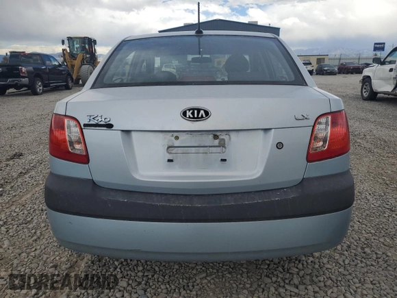 2009 Kia Rio LX with VIN KNADE223496469797, listed as a Copart auction lot 71005774 with 130,675 mi miles and Salvage Title. Bid and sale history available at DreamBid. Image 6.