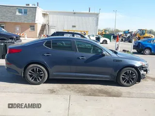 2015 Kia Optima LX with VIN 5XXGM4A77FG381505, listed as a IAAI auction lot 42105568 with 164,641 mi miles and . Bid and sale history available at DreamBid. Image 14.