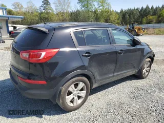 2011 Kia Sportage LX with VIN KNDPB3A29B7153383, listed as a Copart auction lot 52118075 with 191,742 mi miles and Salvage Title. Bid and sale history available at carsss.com. Image 3.
