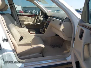 1999 Mercedes-Benz E-Class with VIN WDBJF65H6XA867166, listed as a IAAI auction lot 42017341 with 89,841 mi miles. Bid and sale history available at carsss.com. Image 5.