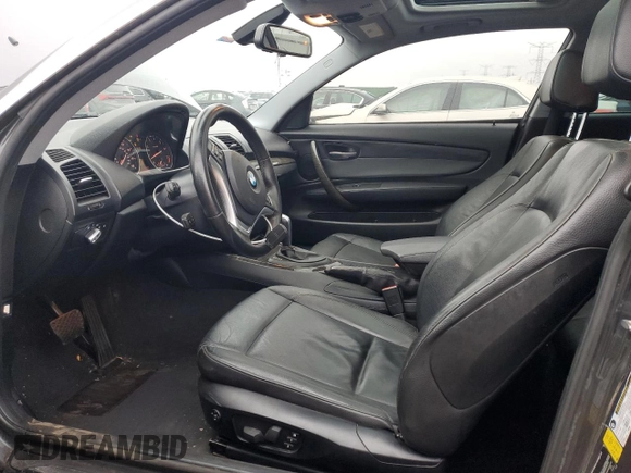 2013 BMW 1 Series 128i with VIN WBAUP7C59DVP24160, listed as a Copart auction lot 84736514 with 91,820 mi miles and Salvage Title. Bid and sale history available at carsss.com. Image 7.