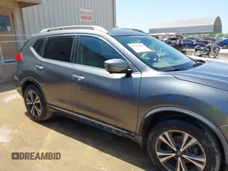 2017 Nissan Rogue SL with VIN JN8AT2MT2HW407004, listed as a IAAI auction lot 41884121 with 79,227 mi miles and . Bid and sale history available at DreamBid. Image 13.