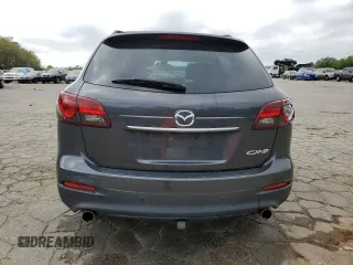 2014 Mazda CX-9 Grand Touring z VIN JM3TB2DA2E0432416, wystawiony jako Copart lot #51324875 z przebiegiem 201 404 mil mil oraz Szkoda całkowita • Salvage title. Historia ofert i sprzedaży dostępna na DreamBid. Obrazek 6.