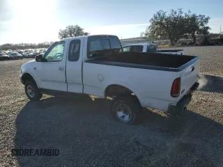1999 Ford F-150 with VIN 2FTRX18W4XCA10583, listed as a Copart auction lot 44982655 with Not provided miles and Salvage title. Bid and sale history available at DreamBid. Image 2.