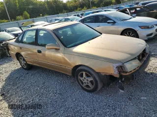 1998 Toyota Avalon XL with VIN 4T1BF18B3WU222354, listed as a Copart auction lot 75029214 with 377,315 mi miles and Non Repairable. Bid and sale history available at DreamBid. Image 4.