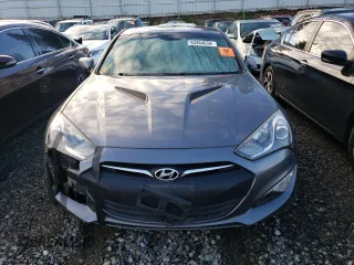 2014 Hyundai Genesis Coupe 2.0T z VIN KMHHT6KD6EU119079, wystawiony jako Copart lot #83364634 z przebiegiem 85 647 mil mil oraz Szkoda całkowita • Salvage title. Historia ofert i sprzedaży dostępna na DreamBid. Obrazek 5.