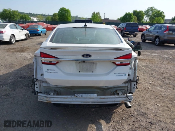 2017 Ford Fusion Hybrid Titanium с VIN 3FA6P0RU7HR148191, выставлен на аукционе IAAI как лот 42167708 с пробегом 72 708 миль миль и . История ставок и продаж доступна на DreamBid. Изображение 17.