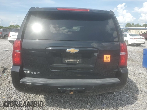 2015 Chevrolet Tahoe LT с VIN 1GNSCBKC9FR718757, выставлен на аукционе Copart как лот 59955345 с пробегом 166 146 миль миль и Списание • Salvage title. История ставок и продаж доступна на DreamBid. Изображение 6.
