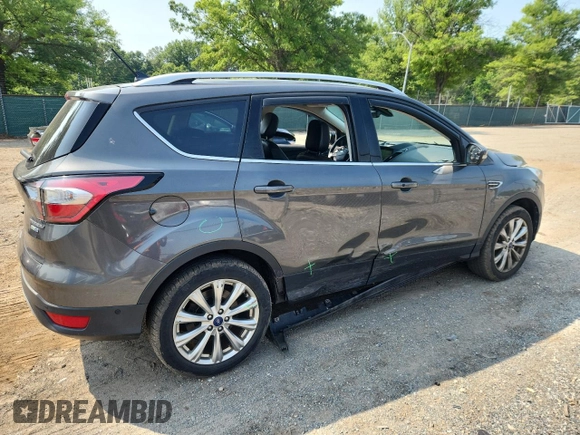 2018 Ford Escape Titanium with VIN 1FMCU9J90JUA15154, listed as a Copart auction lot 59768415 with 93,810 mi miles and Salvage title. Bid and sale history available at DreamBid. Image 3.