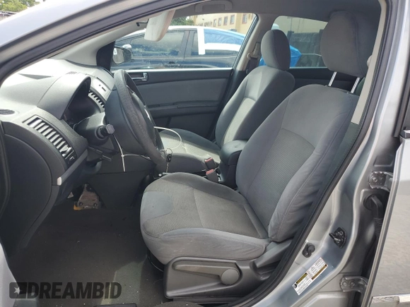 2010 Nissan Sentra S with VIN 3N1AB6APXAL626496, listed as a Copart auction lot 62386815 with 145,228 mi miles and Salvage title. Bid and sale history available at DreamBid. Image 7.