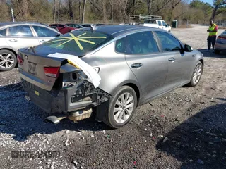 2016 Kia Optima EX with VIN 5XXGU4L3XGG052034, listed as a IAAI auction lot 41506088 with 87,509 mi miles and . Bid and sale history available at DreamBid. Image 4.