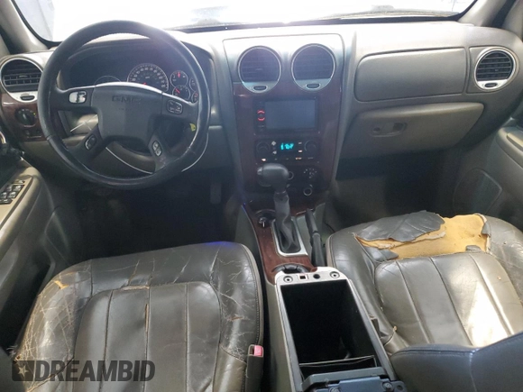 2003 GMC Envoy SLT with VIN 1GKES16S436240107, listed as a Copart auction lot 52327005 with 237,745 mi miles and Clean Title. Bid and sale history available at carsss.com. Image 8.