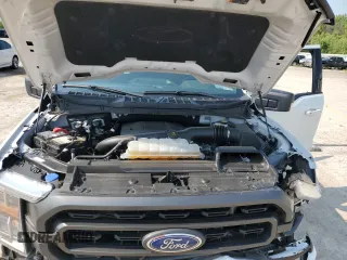 2023 Ford F-150 XL with VIN 1FTFW1E81PFA70563, listed as a Copart auction lot 60440685 with 31,198 mi miles and Salvage title. Bid and sale history available at DreamBid. Image 11.