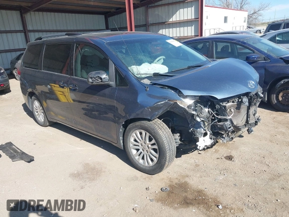 2014 Toyota Sienna XLE with VIN 5TDYK3DC2ES500586, listed as a IAAI auction lot 41995867 with 148,861 mi miles and . Bid and sale history available at DreamBid. Image 1.