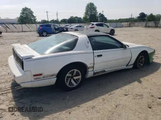 1991 Pontiac Firebird z VIN 1G2FS23E5ML239639, wystawiony jako Copart lot #54986095 z przebiegiem 154 017 mil mil oraz Tytuł czysty. Historia ofert i sprzedaży dostępna na DreamBid. Obrazek 3.