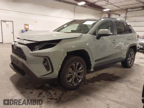 2023 Toyota RAV4 Hybrid XLE Premium z VIN 4T3B6RFV0PU118506, wystawiony jako IAAI lot #41972785 z przebiegiem 16 496 mil mil oraz . Historia ofert i sprzedaży dostępna na DreamBid. Obrazek 2.