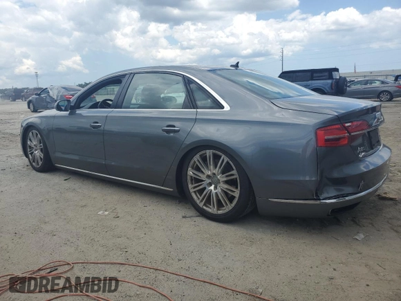 2015 Audi A8 4.0T with VIN WAU32AFD5FN040395, listed as a Copart auction lot 60909515 with 79,379 mi miles and Salvage title. Bid and sale history available at DreamBid. Image 2.