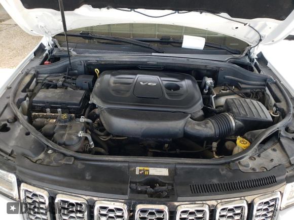 2018 Jeep Grand Cherokee Overland z VIN 1C4RJFCG4JC425589, wystawiony jako Copart lot #61775775 z przebiegiem 102 040 mil mil oraz Szkoda całkowita • Salvage title. Historia ofert i sprzedaży dostępna na DreamBid. Obrazek 12.
