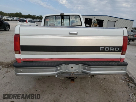 1992 Ford F-150 with VIN 1FTEX15N5NKA30134, listed as a Copart auction lot 76131814 with 213,258 mi miles and Salvage Title. Bid and sale history available at carsss.com. Image 6.