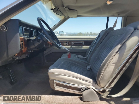 1983 Oldsmobile Toronado with VIN 1G3AZ57Y8DE312949, listed as a Copart auction lot 65228244 with 159,172 mi miles and Salvage Title. Bid and sale history available at DreamBid. Image 7.