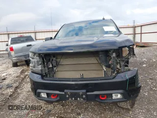 2021 Chevrolet Silverado 1500 LT Trail Boss with VIN 1GCPYFEDXMZ130455, listed as a IAAI auction lot 41140924 with 52,293 mi miles and . Bid and sale history available at DreamBid. Image 13.