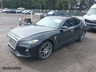 2020 Genesis G70 2.0T with VIN KMTG44LAXLU062079, listed as a IAAI auction lot 41913591 with 24,556 mi miles. Bid and sale history available at carsss.com. Image 2.