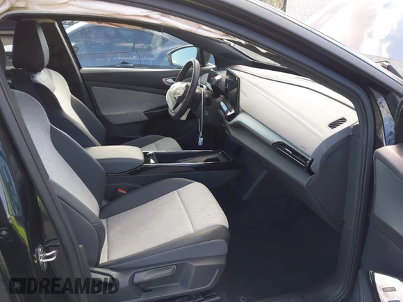 2023 Volkswagen ID.4 Pro z VIN 1V2DNPE85PC028748, wystawiony jako IAAI lot #41348983 z przebiegiem 7 434 mil mil oraz . Historia ofert i sprzedaży dostępna na DreamBid. Obrazek 5.