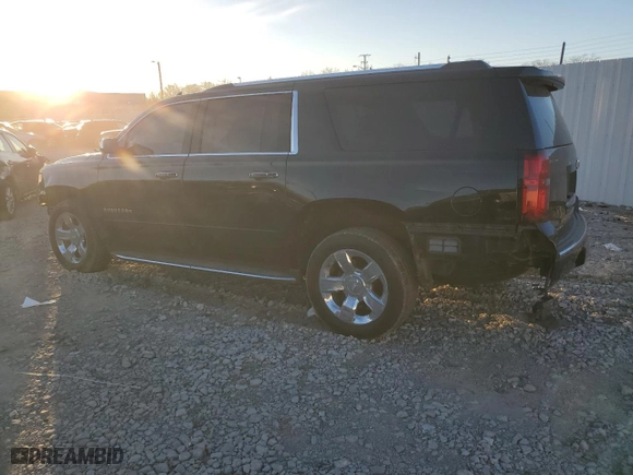 2017 Chevrolet Suburban Premier with VIN 1GNSKJKC5HR303600, listed as a Copart auction lot 83395644 with 124,465 mi miles and Salvage Title. Bid and sale history available at carsss.com. Image 2.