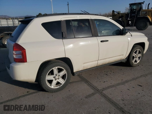 2007 Jeep Compass Sport with VIN 1J8FF47W07D199198, listed as a Copart auction lot 52092675 with 131,346 mi miles and Salvage Title. Bid and sale history available at carsss.com. Image 3.