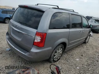 2014 Chrysler Town & Country Touring with VIN 2C4RC1BGXER395493, listed as a Copart auction lot 64263214 with 142,844 mi miles and Salvage Title. Bid and sale history available at DreamBid. Image 3.