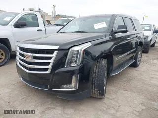2018 Cadillac Escalade Luxury with VIN 1GYS4BKJ3JR143952, listed as a IAAI auction lot 41333902 with 124,265 mi miles. Bid and sale history available at carsss.com. Image 2.