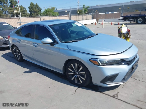 2022 Honda Civic Sedan EX with VIN 2HGFE1F77NH309152, listed as a IAAI auction lot 42013565 with 25,474 mi miles. Bid and sale history available at carsss.com. Image 1.