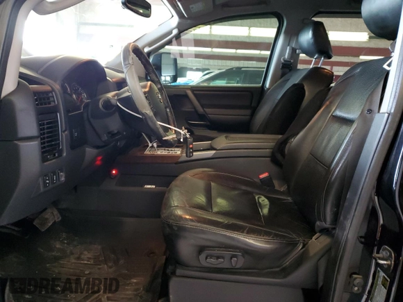 2011 Nissan Titan Pro-4X with VIN 1N6AA0EC5BN307980, listed as a Copart auction lot 42000295 with 168,335 mi miles and Salvage title. Bid and sale history available at DreamBid. Image 7.
