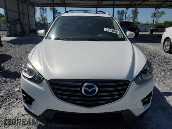 2016 Mazda CX-5 Grand Touring with VIN JM3KE4DY0G0819528, listed as a Copart auction lot 52343885 with 77,340 mi miles and Clean Title. Bid and sale history available at DreamBid. Image 5.