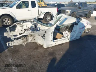 2014 Nissan 370Z Nismo z VIN JN1AZ4EH6EM632536, wystawiony jako IAAI lot #40836696 z przebiegiem Nie podano mil oraz . Historia ofert i sprzedaży dostępna na DreamBid. Obrazek 2.