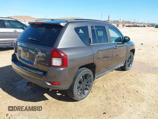 2014 Jeep Compass Sport with VIN 1C4NJCBA4ED880940, listed as a IAAI auction lot 41712357 with 156,171 mi miles. Bid and sale history available at carsss.com. Image 4.