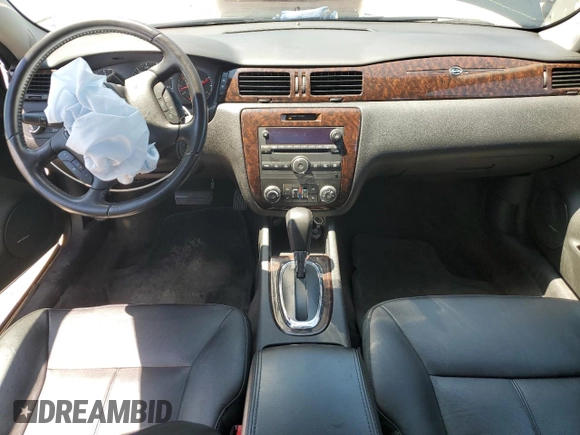 2014 Chevrolet Impala LTZ with VIN 2G1WC5E32E1182483, listed as a Copart auction lot 60308935 with 116,714 mi miles and Salvage title. Bid and sale history available at DreamBid. Image 8.
