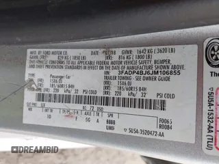 2018 Ford Fiesta SE z VIN 3FADP4BJ6JM106855, wystawiony jako IAAI lot #42491262 z przebiegiem 166 397 mil mil oraz . Historia ofert i sprzedaży dostępna na DreamBid. Obrazek 9.