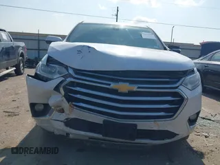 2020 Chevrolet Traverse High Country with VIN 1GNEVNKWXLJ135322, listed as a IAAI auction lot 42042466 with 105,748 mi miles and . Bid and sale history available at DreamBid. Image 6.