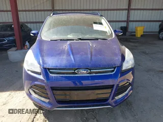 2016 Ford Escape Titanium with VIN 1FMCU9JXXGUB58961, listed as a IAAI auction lot 41772977 with 122,665 mi miles. Bid and sale history available at carsss.com. Image 12.